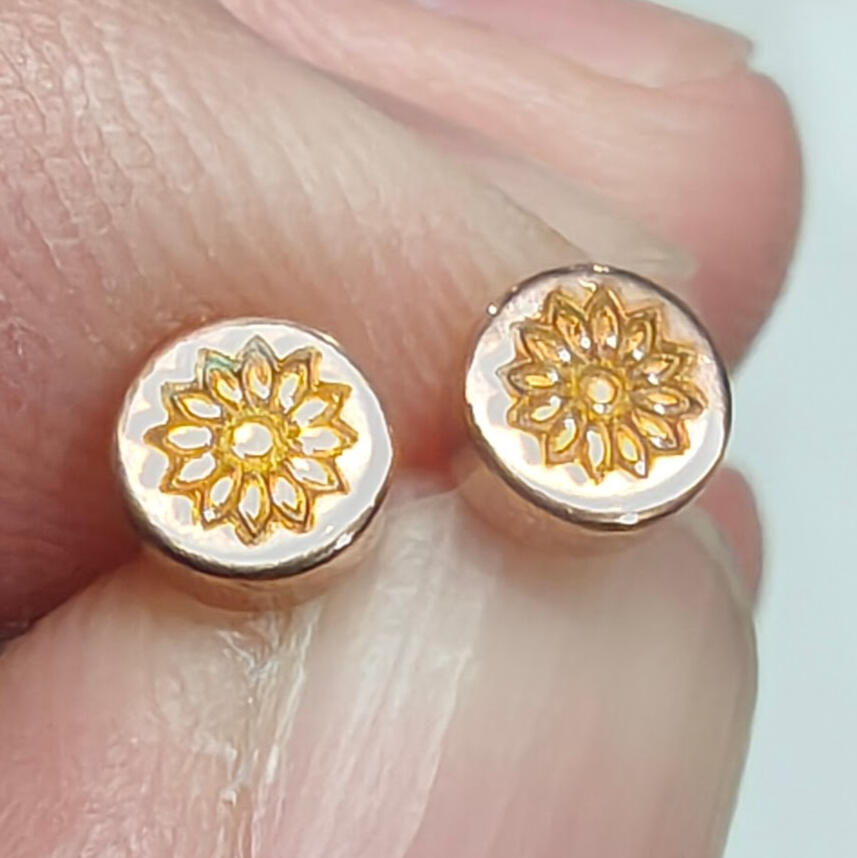 Yellow flower stainless steel earrings.